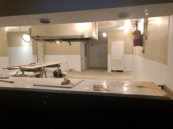 Installing FRP and painting in kitchen.  Ready for new epoxy floor